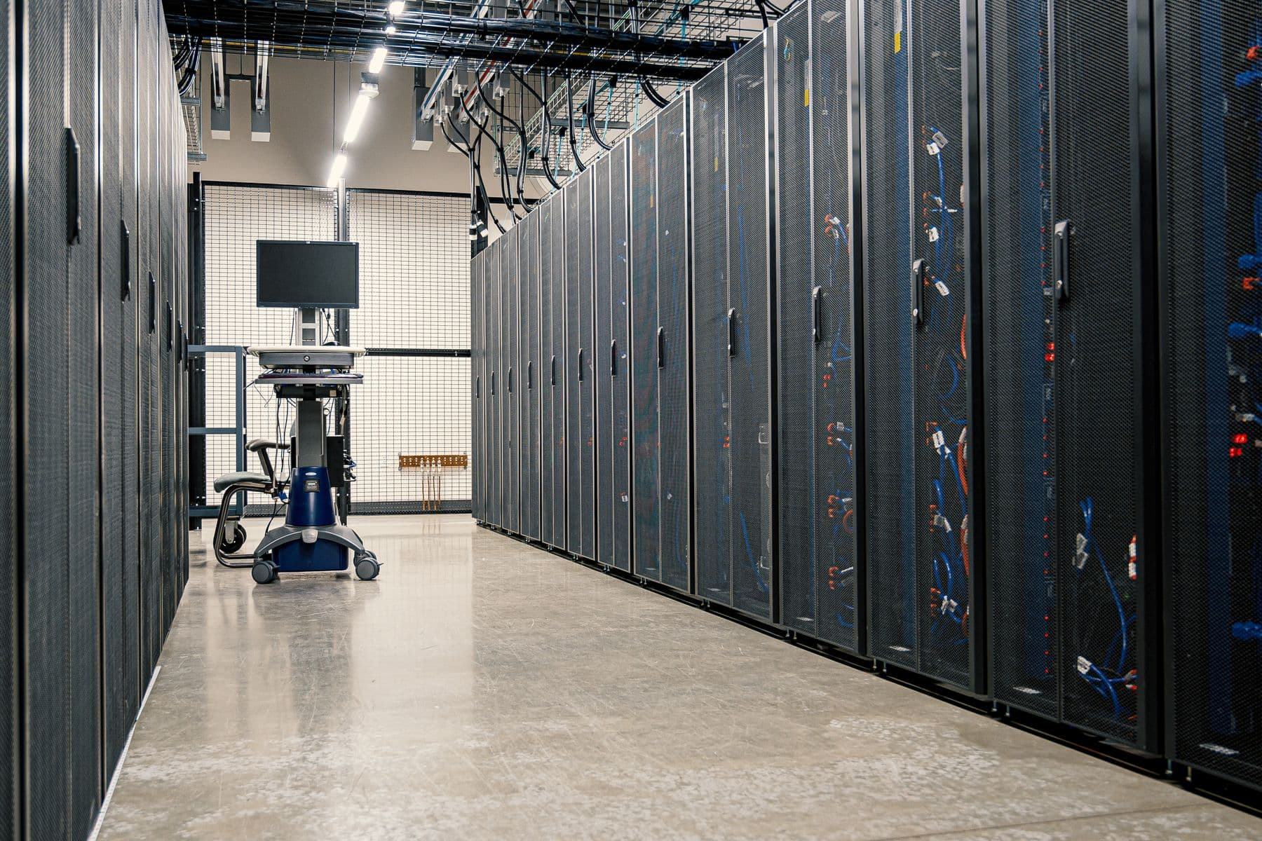 Modern data centre corridor with network racks